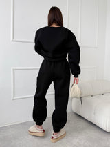 ČIERNE TEPLÁKOVÉ NOHAVICE SELF LOVE